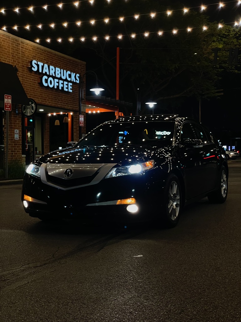 An Acura at night